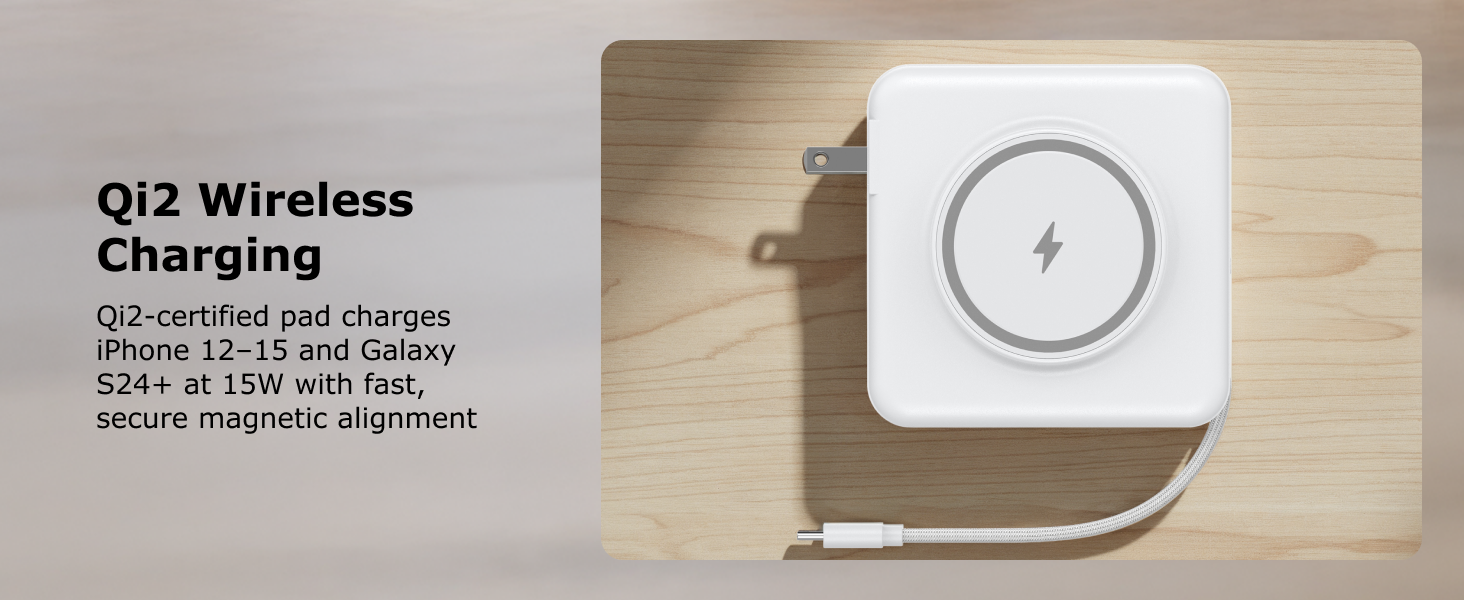 Qi2 wireless charging pad on wood desk