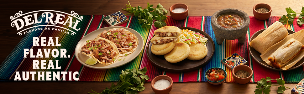 Authentic Mexican food spread on colorful tablecloth